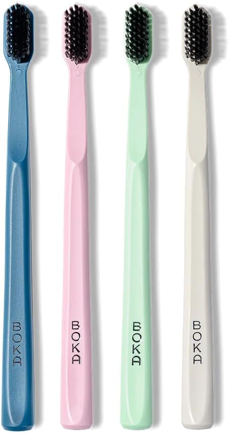Boka_Classic_Manual_Toothbrush_with_Extra_Soft_Activated-Charcoal,_Tapered_Bristles,_Bioplastic_Handle_that_Includes_Travel_Cap,_Dentist-Approved,_Great_for_Adults_and_Kids,_Multi_Color_(Pack_of_4)