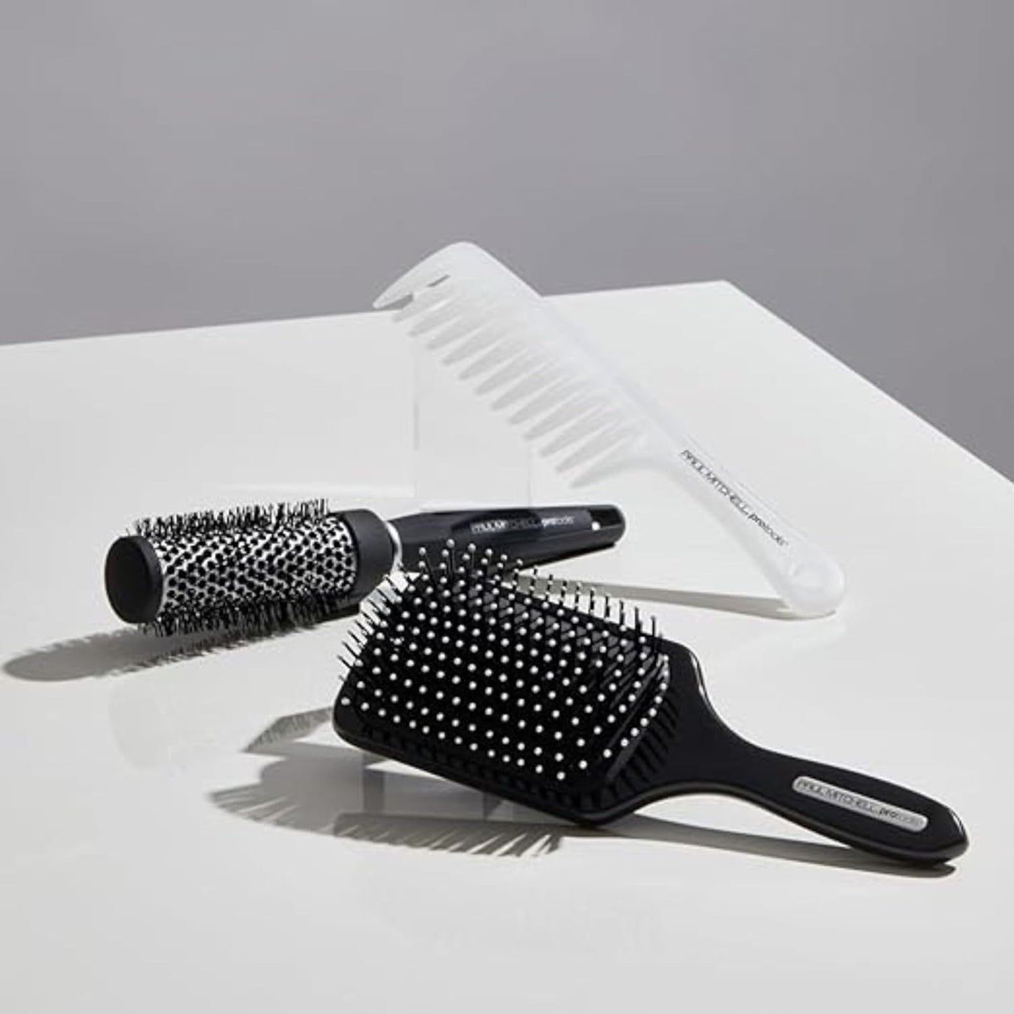 Paul_Mitchell_Pro_Tools_427_Paddle_Brush,_For_Blow-Drying_+_Smoothing_Long_or_Thick_Hair