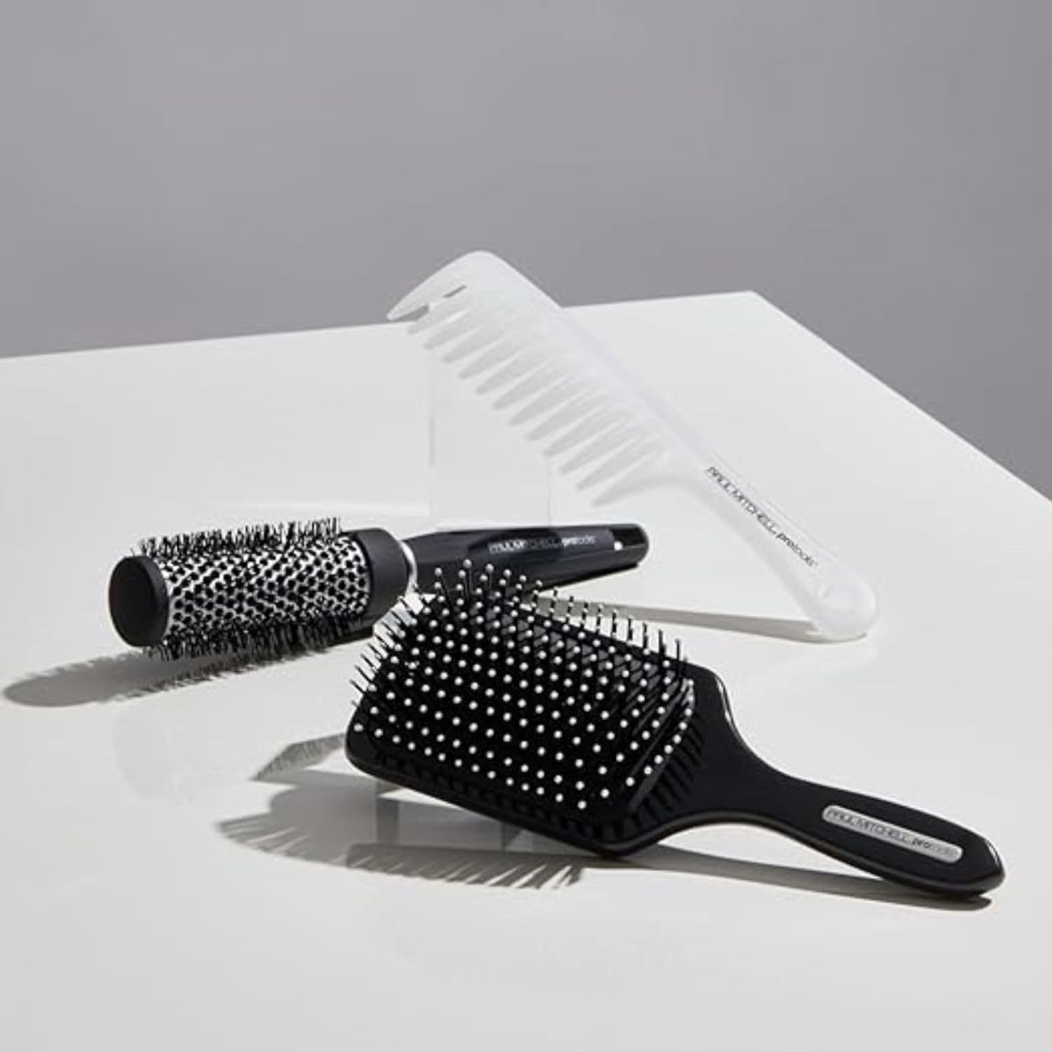 Paul_Mitchell_Pro_Tools_427_Paddle_Brush,_For_Blow-Drying_+_Smoothing_Long_or_Thick_Hair