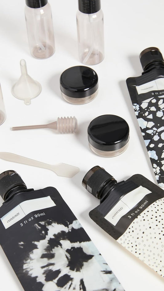 Kitsch_11_PCS_Travel_Containers_for_Toiletries_–_Travel_Essentials_Kit_for_Shampoo,_&_More_-_TSA_Approved_Bottles_for_Travel_Size_Toiletries,_Leak-Proof_Refillable_Travel_Containers_-_Black_&_Ivory