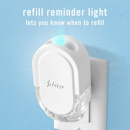 Febreze_Plug_In_Air_Freshener,_Odor-Fighting_Scented_Oil_Refill,_Air_Fresheners_for_Home_and_Bathroom_and_Kitchen,_Long_Lasting_for_Strong_Odors,_Ocean_&_Mountain_Scents,_0.87oz_Refills,_4_Count