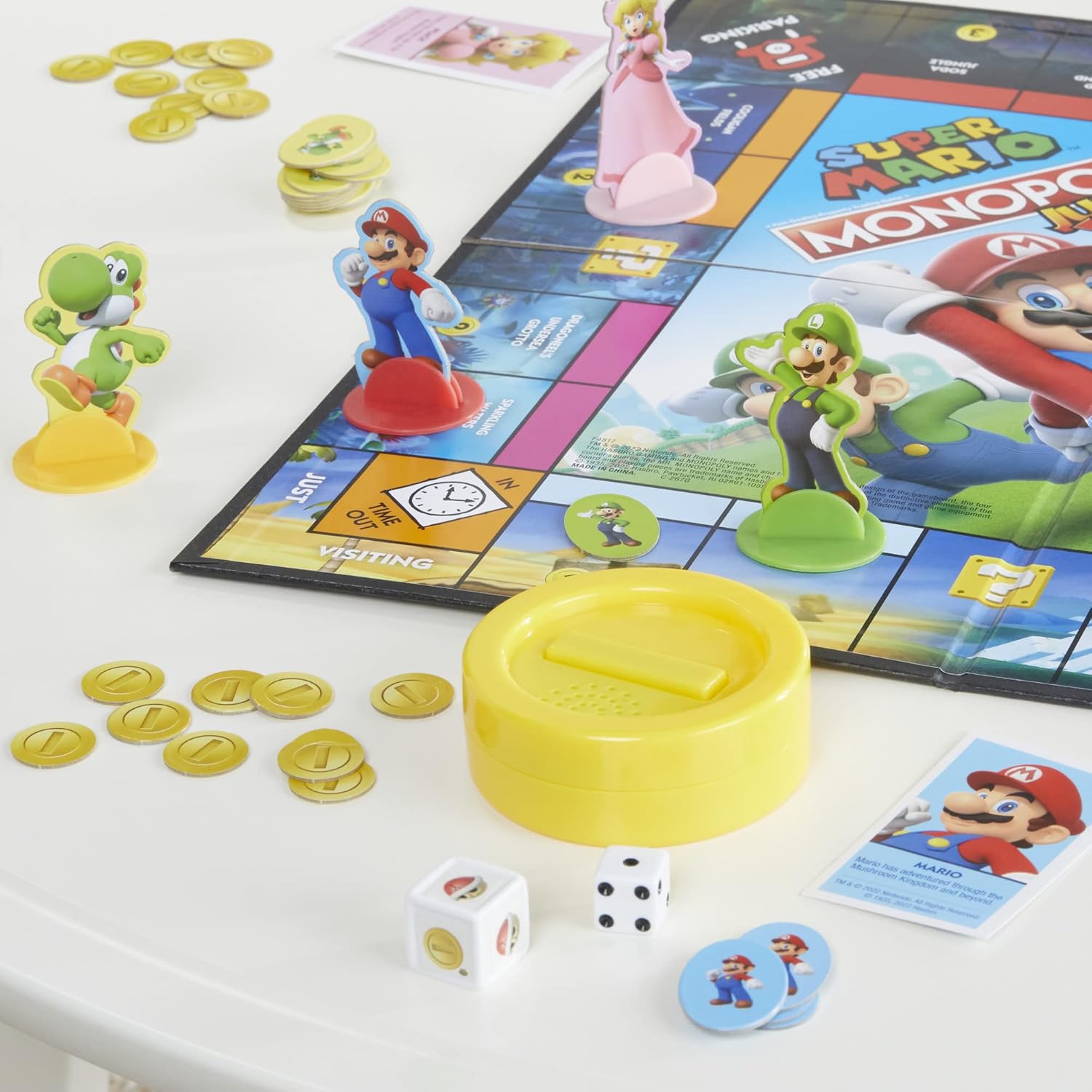 Monopoly_Junior_Super_Mario_Edition_Board_Game,_Fun_Kids'_Ages_5_and_Up,_Explore_The_Mushroom_Kingdom_as_Mario,_Peach,_Yoshi,_or_Luigi_(Amazon_Exclusive)