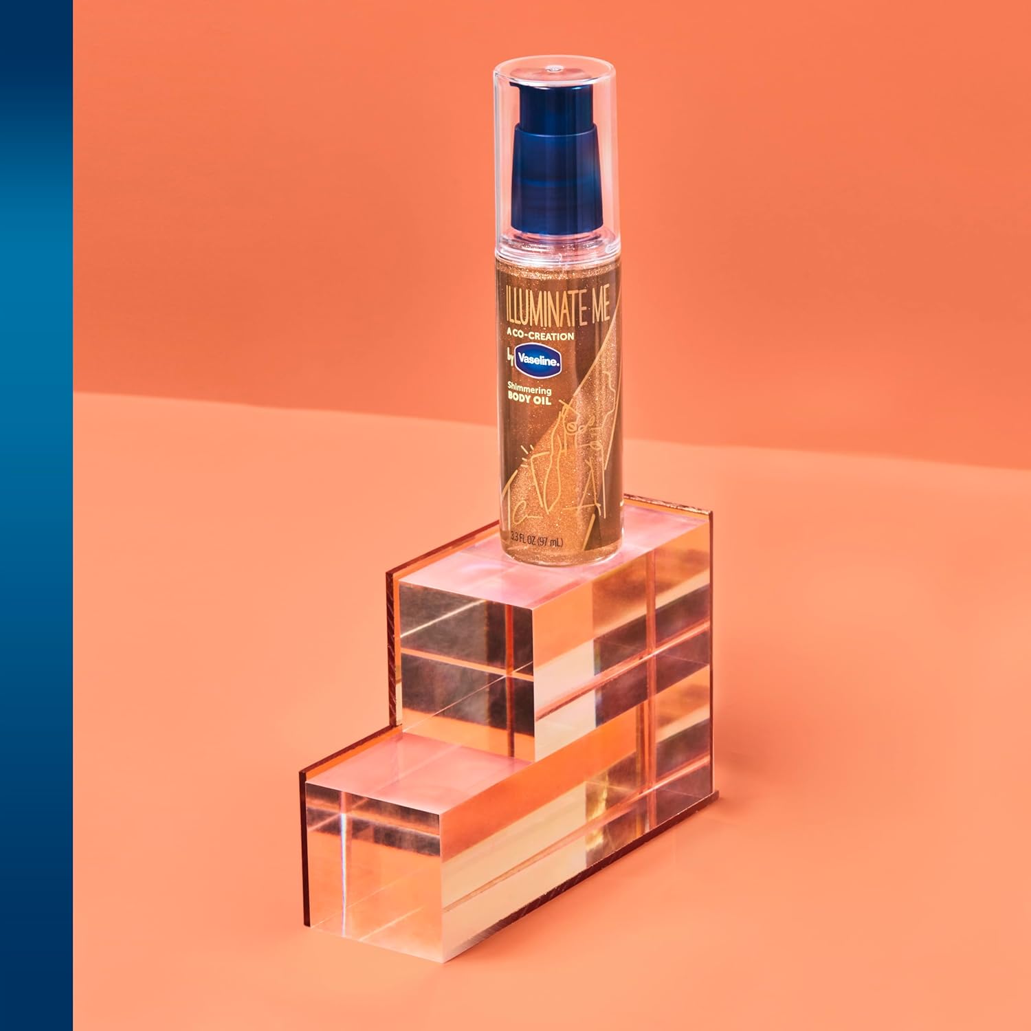 Vaseline_Illuminate_Me_Shimmering_Body_Oil_Created_for_Melanin_Rich_Skin,_Illuminates_Skin_with_Finishing_Touch_of_Shimmer_for_Glowing_Skin_3.3_oz