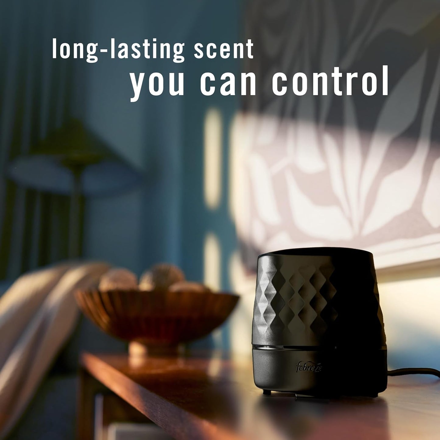 Febreze_Plug_Scent_Booster_in_Black,_Continuous_Scent_Device_Oil_Diffuser,_Compatible_with_Febreze_Air_Freshener_Plug_in_Refills_-_Refills_not_Included
