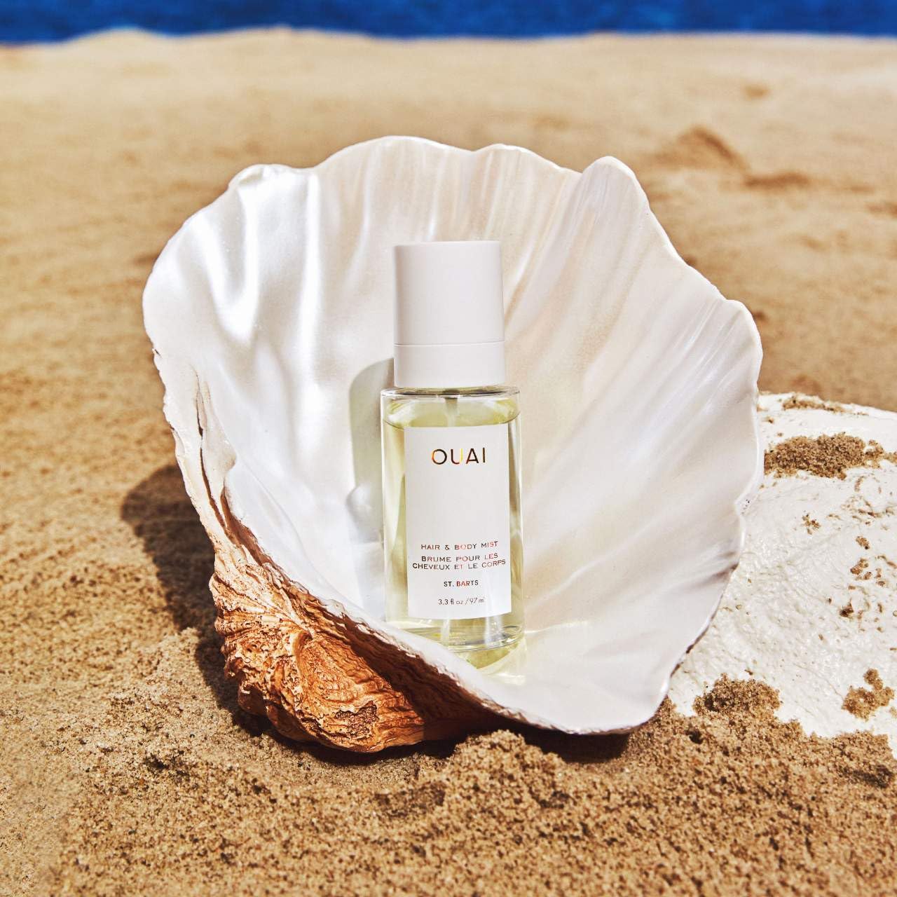 OUAI_St._Barts_Hair_and_Body_Mist_-_Tropical-Scented_Hair_Perfume_and_Body_Spray_-_Notes_of_Dragonfruit,_Orange_Blossom,_Tuberose_&_Musk_(3.3_Fl_Oz)