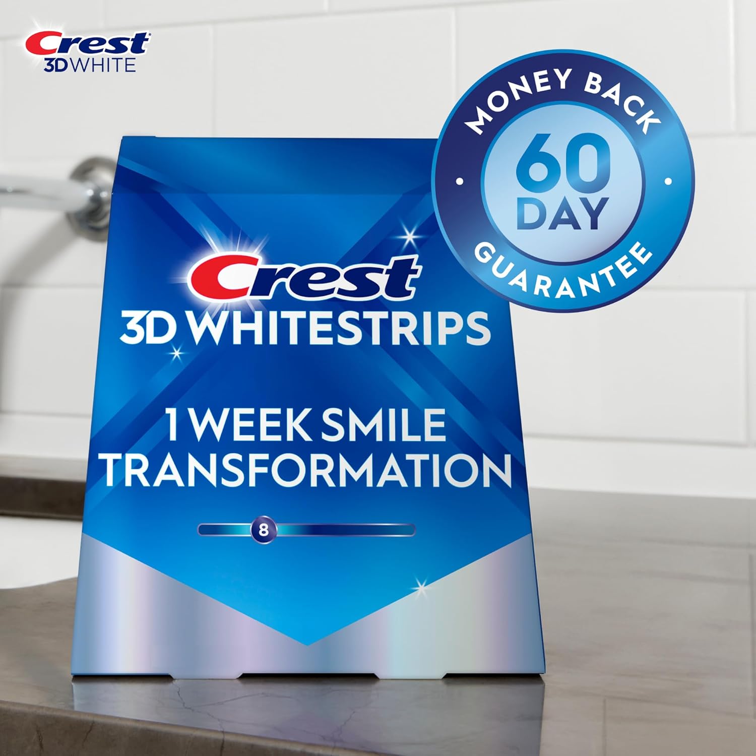 Crest_3D_Whitestrips,_1_Week_Smile_Transformation,_Whitestrips_3D_White,_Teeth_Whitening_Strip_Kit,_14_Treatments_(Each_with_1_Upper/1_Lower),_28_Strips