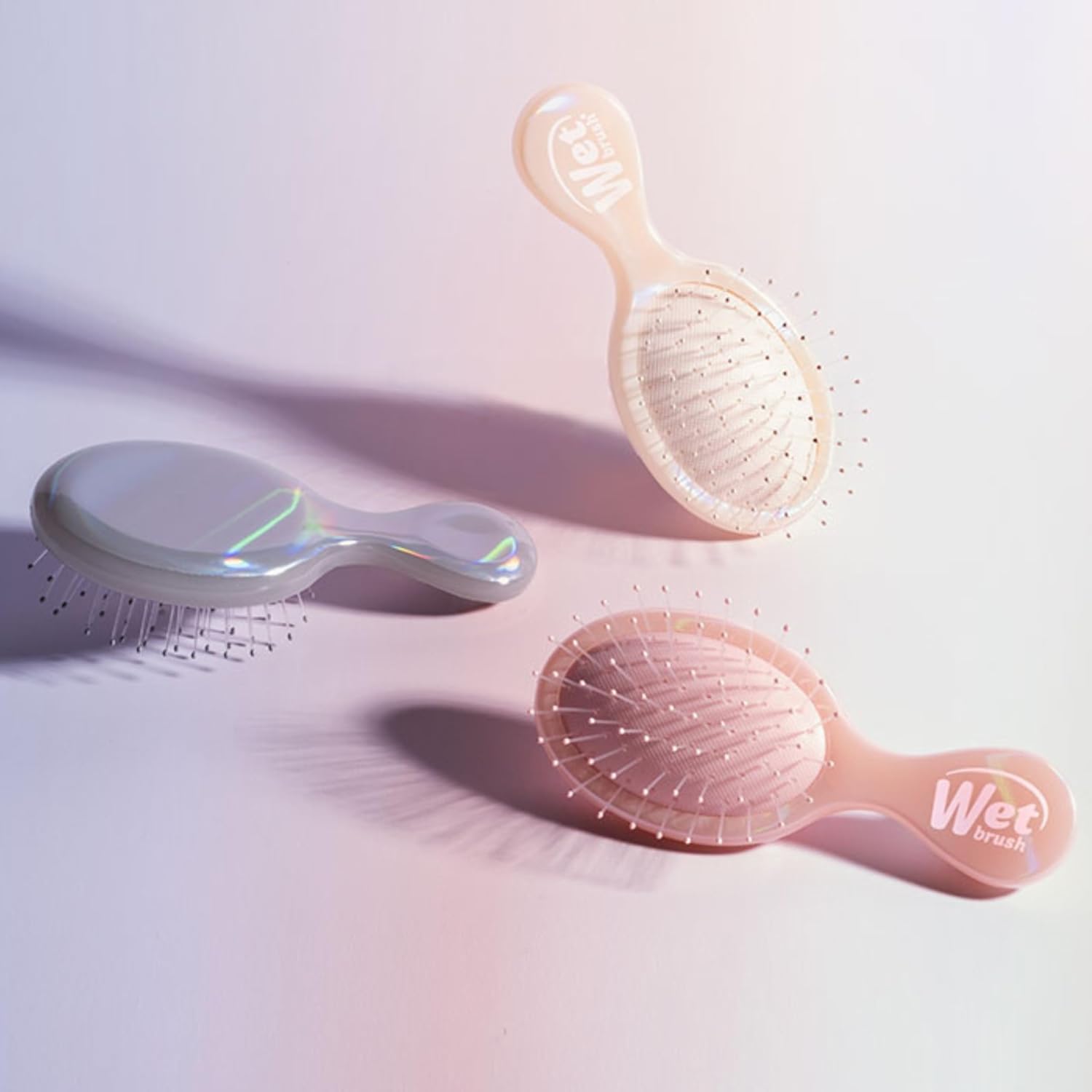 Wet_Brush_Mini_Detangler_Hair_Brush,_Cream_(Iridescence_Icon),_Detangling_Travel_Hairbrush,_Ultra-Soft_IntelliFlex_Bristles_Glide_Through_Tangles_with_Ease,_Pain-Free,_All_Hair_Types,_Limited_Edition