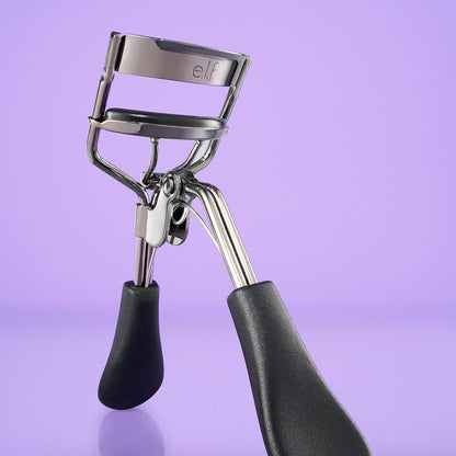 e.l.f._Pro_Eyelash_Curler,_Strong,_Contoured,_Eye-Opening,_Voluminous_Lashes,_Includes_Additional_Rubber_Replacement_Pad,_Silver