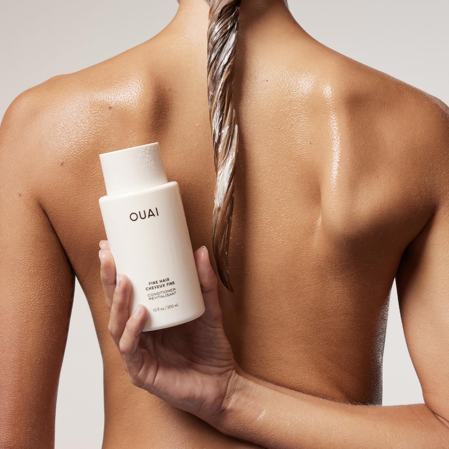 OUAI_Fine_Hair_Conditioner_-_Volumizing_Conditioner_for_Fine_Hair_Made_with_Keratin,_Biotin_and_Chia_Seed_Oil_-_Adds_Softness,_Bounce_and_Volume_-_Free_from_Parabens,_Sulfates,_and_Phthalates_(10_Oz)