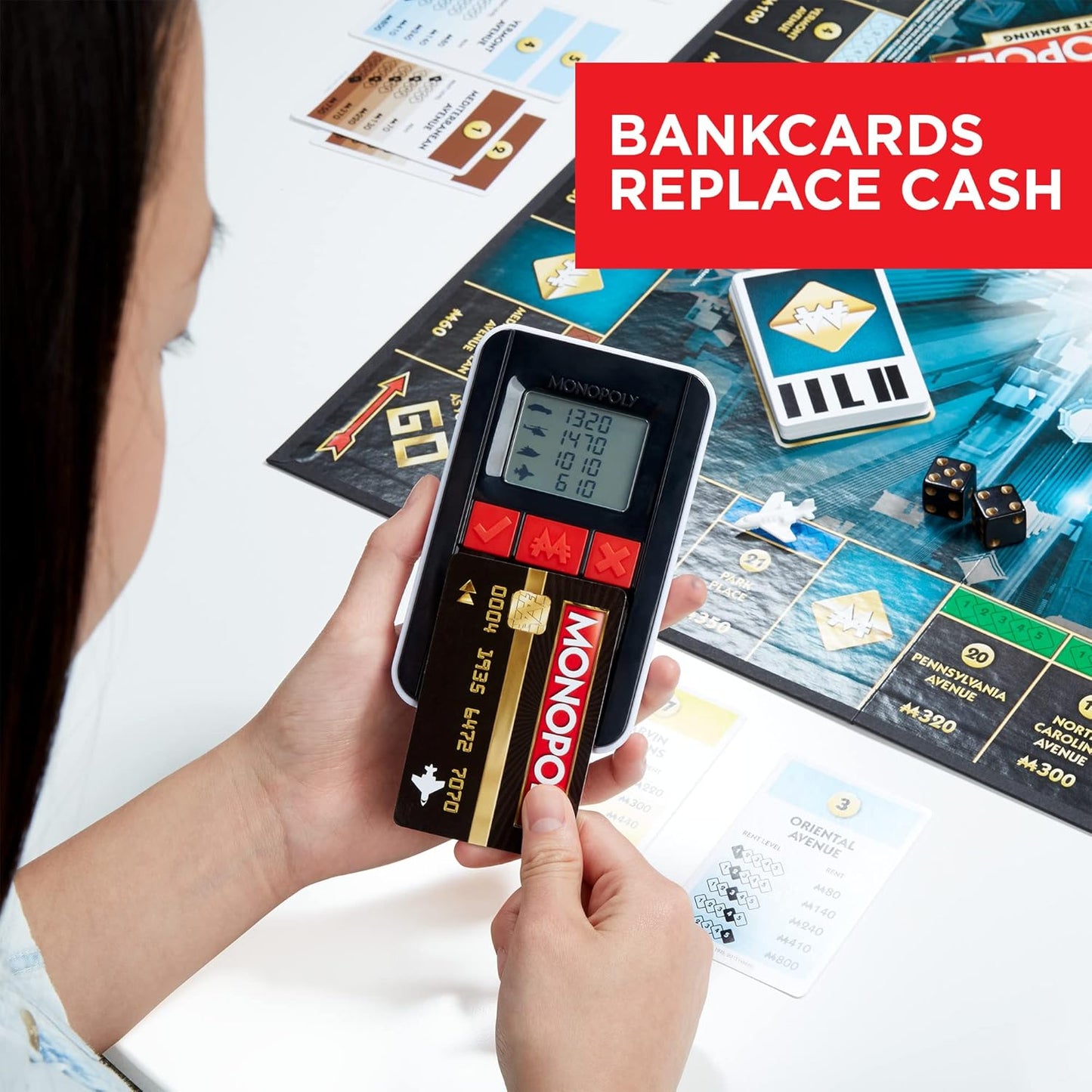 Hasbro_Gaming_Monopoly_Ultimate_Banking_Edition_Board_Game_for_Families_and_Kids_Ages_8_and_Up,_Electronic_Banking_Unit_(Amazon_Exclusive)