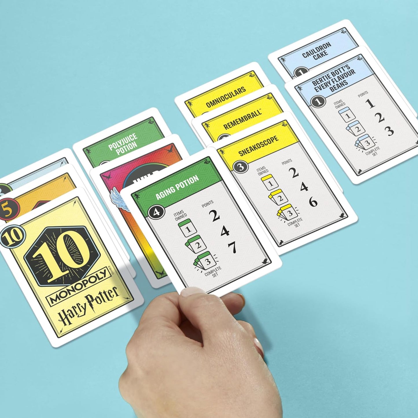 Monopoly_Deal:_Harry_Potter_Card_Game_|_Family_Games_for_Kids_and_Adults_|_Ages_8_and_Up_|_2_to_5_Players_|_15_mins._|_Travel_Size