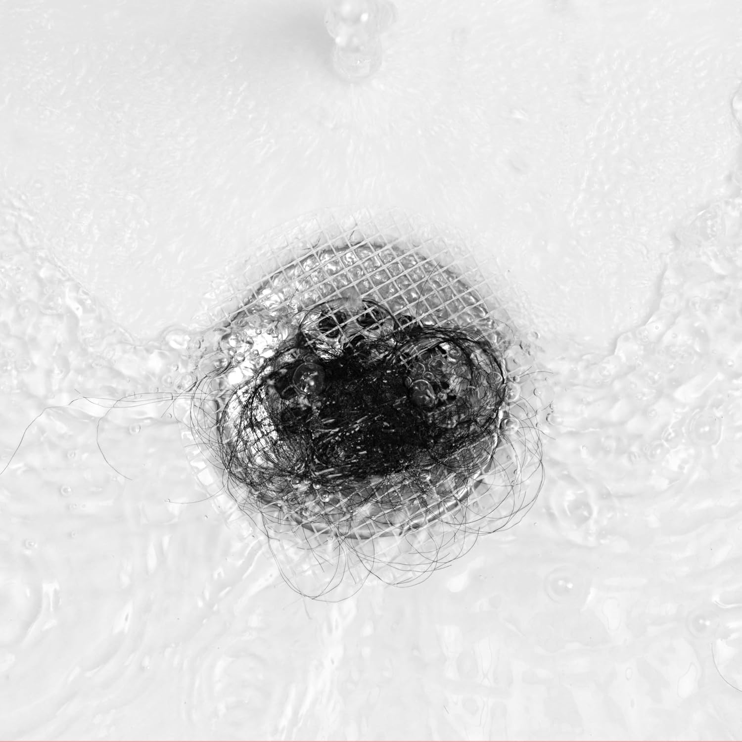 TubShroom_Toss_26pk_Disposable_Drain_Covers_-_Hair_Catcher_Mesh_Sticker_Strainers_for_Shower_Bathtub_and_Bathroom_Sink_Drains_to_Prevent_Clogged_Drains,_Half_Year_Supply