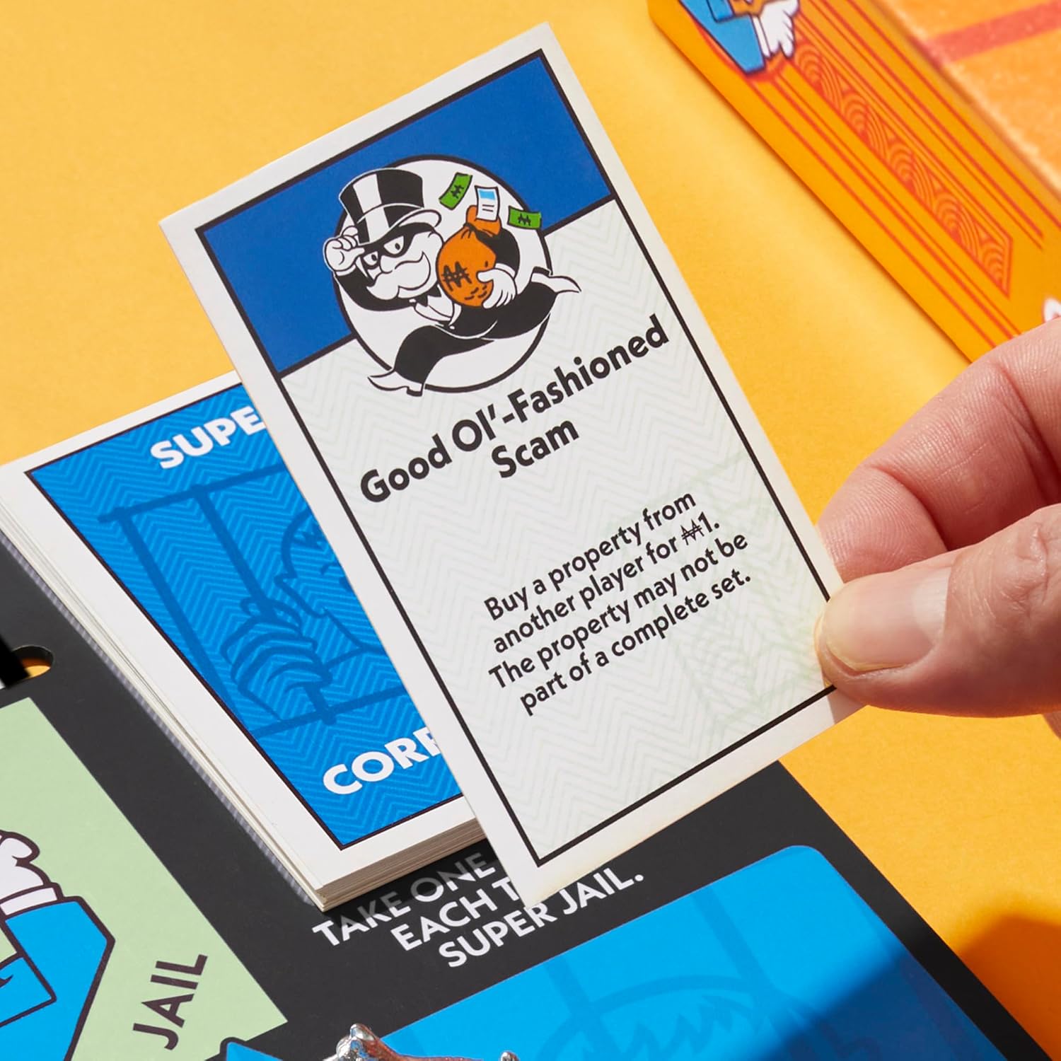 Monopoly_Go_to_Jail_Expansion_|_Add_More_Fun_to_Classic_Monopoly_Game_and_Play_Faster_|_Ages_8+_|_2-6_Players_|_40_Mins._|_Family_Board_Games