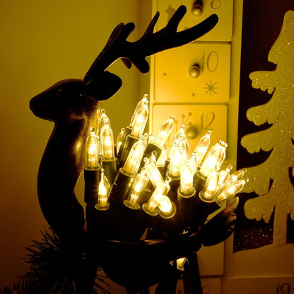 Blissun_Christmas_Lights,_50-Count_Green_Wire_Light_Set,_Battery_Operated_Christmas_Mini_String_Light_with_8_Modes,_16_ft_Fairy_Lights_for_Christmas_Tree_Garden_Wreath_Decorations_(2_Pack,_Warm_White)