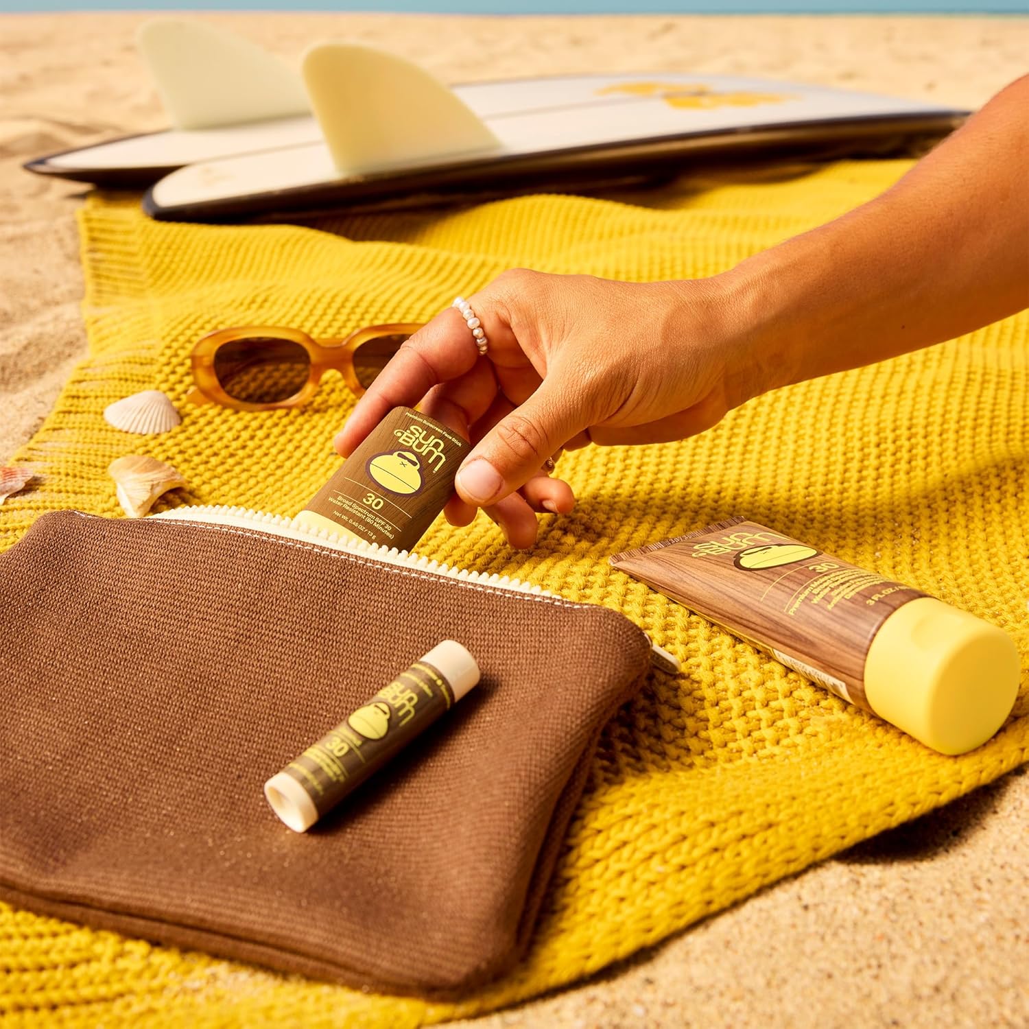 Sun_Bum_Road_Tripper_-_Travel_Sized_Sun_Care_Pack_with_Sunscreen_Lotion,_Face_Stick,_and_Lip_Balm_-_SPF_30_Broad_Spectrum_UVA/UVB_Protection_-_Hawaii_104_Act_Compliant_-_TSA_Friendly