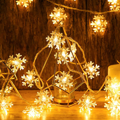Snowflake_Lights,_20_Ft_40_LED_Battery_Operated_Christmas_String_Lights_Waterproof_Snowflake_Fairy_Lights_Indoor_Outdoor_for_Bedroom_Home_Patio_Garden_Party_Xmas_Tree_Decorations_Warm_White