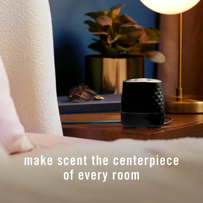 Febreze_Plug_Scent_Booster_in_Black,_Continuous_Scent_Device_Oil_Diffuser,_Compatible_with_Febreze_Air_Freshener_Plug_in_Refills_-_Refills_not_Included