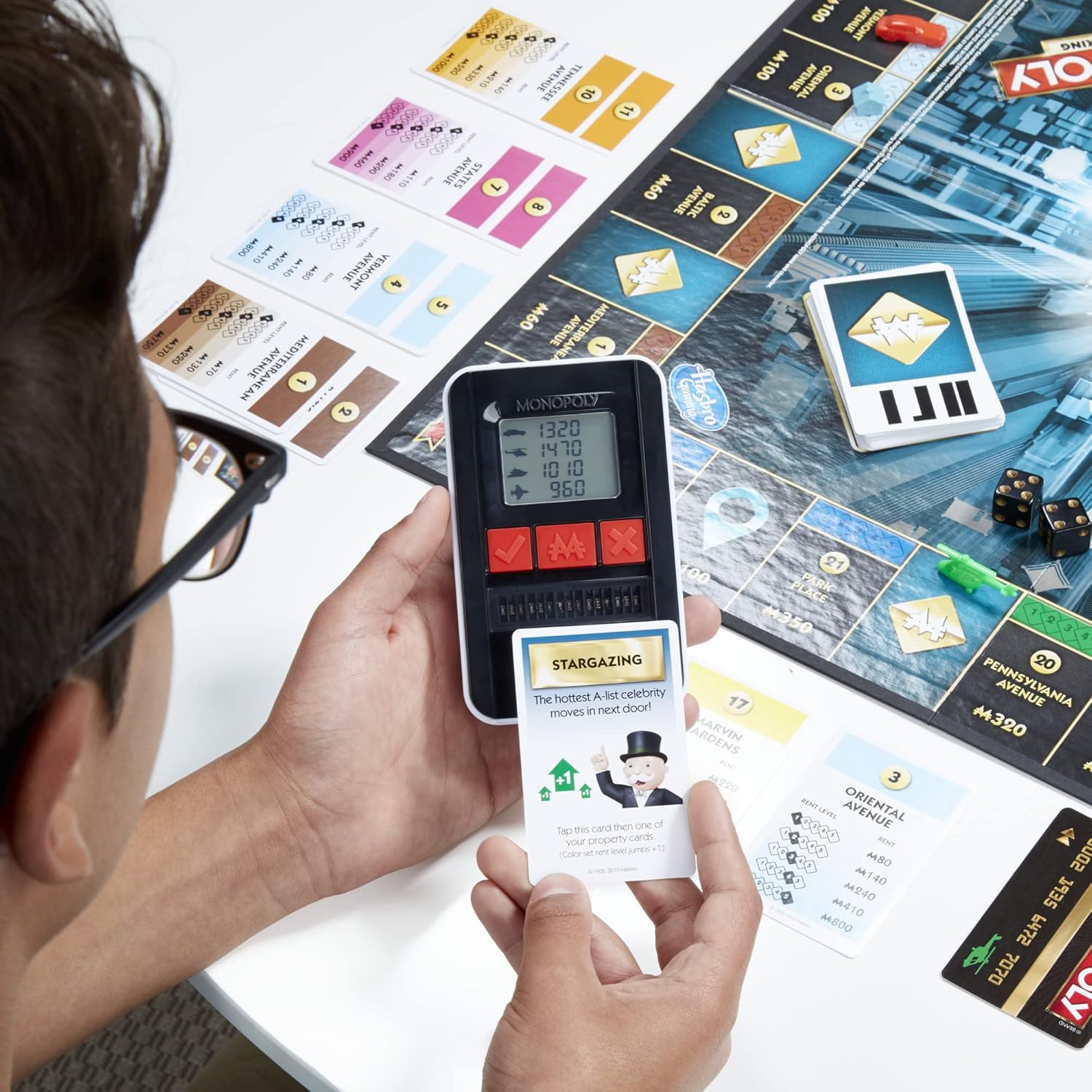 Hasbro_Gaming_Monopoly_Ultimate_Banking_Edition_Board_Game_for_Families_and_Kids_Ages_8_and_Up,_Electronic_Banking_Unit_(Amazon_Exclusive)