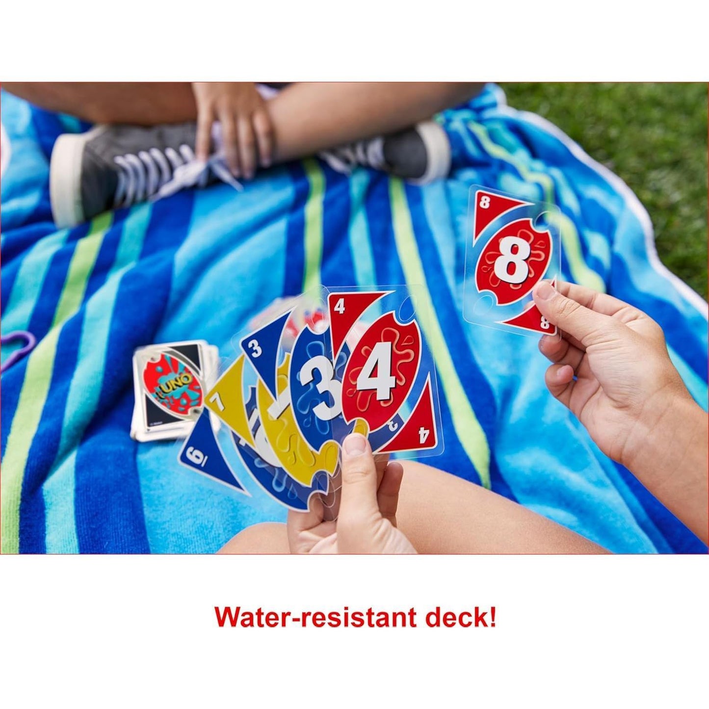 Games_​UNO_Splash_Card_Game_for_Outdoor_Camping,_Travel_and_Family_Night_with_Water-Resistent_Plastic_Cards
