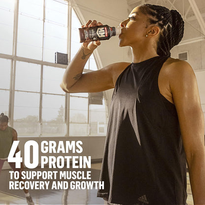 Muscle_Milk_Pro_Advanced_Nutrition_Protein_Shake,_Intense_Vanilla,_14_Fl_Oz_Bottle,_12_Pack,_40g_Protein,_1g_Sugar,_16_Vitamins_&_Minerals,_6g_Fiber,_Workout_Recovery,_Packaging_May_Vary