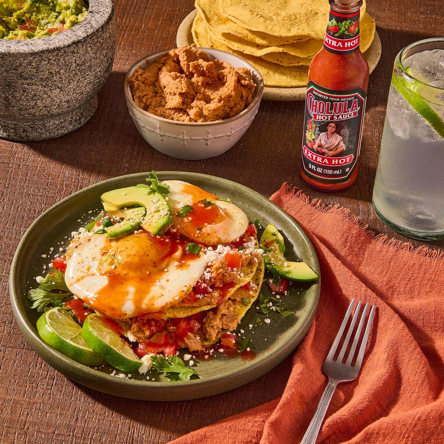 Cholula_Hot_Sauce,_Extra_Hot,_Product_of_Mexico,_Blend_of_Arbol_&_Piquin_Peppers_for_Bringing_Extra_Hot_Heat_to_Tacos,_Eggs,_Pizza_and_More,_5_fl_oz