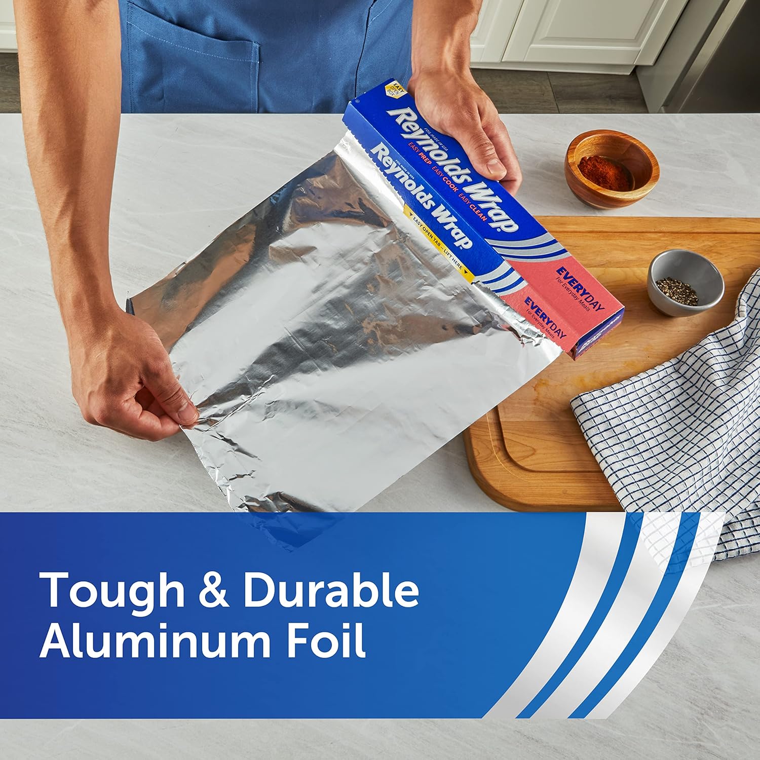Reynolds_Wrap_Everyday_Strength_Aluminum_Foil_Roll,_Freezer_Safe_and_Grill_Safe,_Great_for_Foil_Packets_and_Home_Cooking,_12_Inches_Wide,_200_Total_Sq._Ft.
