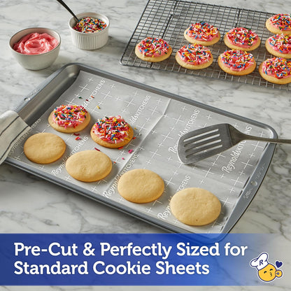 Reynolds_Kitchens_Cookie_Baking_Sheets,_Pre-Cut_Parchment_Paper,_25_Count_per_Pack_(Pack_of_4),_100_Sheets_Total