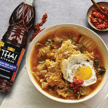 Thai_Kitchen_Premium_Fish_Sauce,_23.66_fl_oz_-_One_23.66_Fluid_Ounce_Bottle_of_Fish_Sauce_Crafted_for_Dressings_and_Marinades_for_a_Sweet,_Tangy_and_Spicy_Flavor
