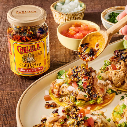 Cholula_Chili_Crisp_Sauce,_Chiles_&_Pepitas,_Crunchy_Topping_for_Tacos,_Tostadas,_Eggs,_Pizza_and_More,_8_oz
