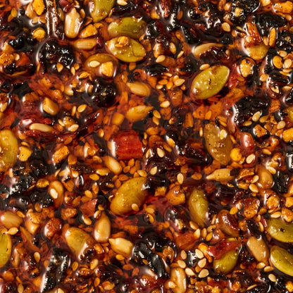 Cholula_Chili_Crisp_Sauce,_Chiles_&_Pepitas,_Crunchy_Topping_for_Tacos,_Tostadas,_Eggs,_Pizza_and_More,_8_oz