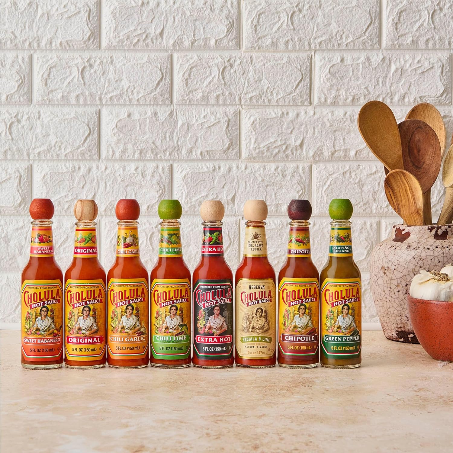 Cholula_Hot_Sauce,_Extra_Hot,_Product_of_Mexico,_Blend_of_Arbol_&_Piquin_Peppers_for_Bringing_Extra_Hot_Heat_to_Tacos,_Eggs,_Pizza_and_More,_5_fl_oz