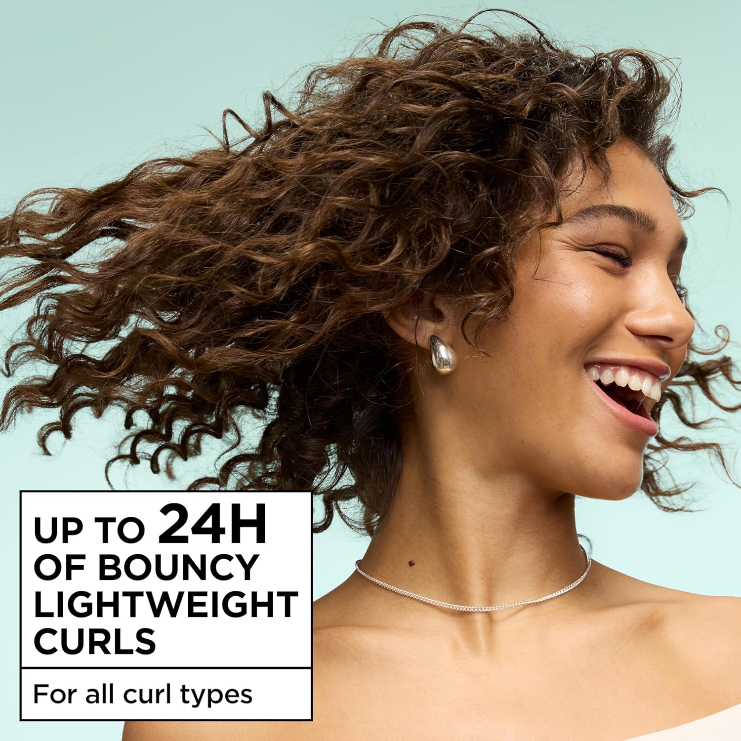 Garnier_Fructis_Curl_Construct_Creation_Mousse,_Curl_Activator_Provides_Frizz_Control,_Long-Lasting_Hold,_and_No_Weigh-Down_for_Curly,_Wavy,_and_Coily_Hair,_6.8_oz_(Packaging_May_Vary)